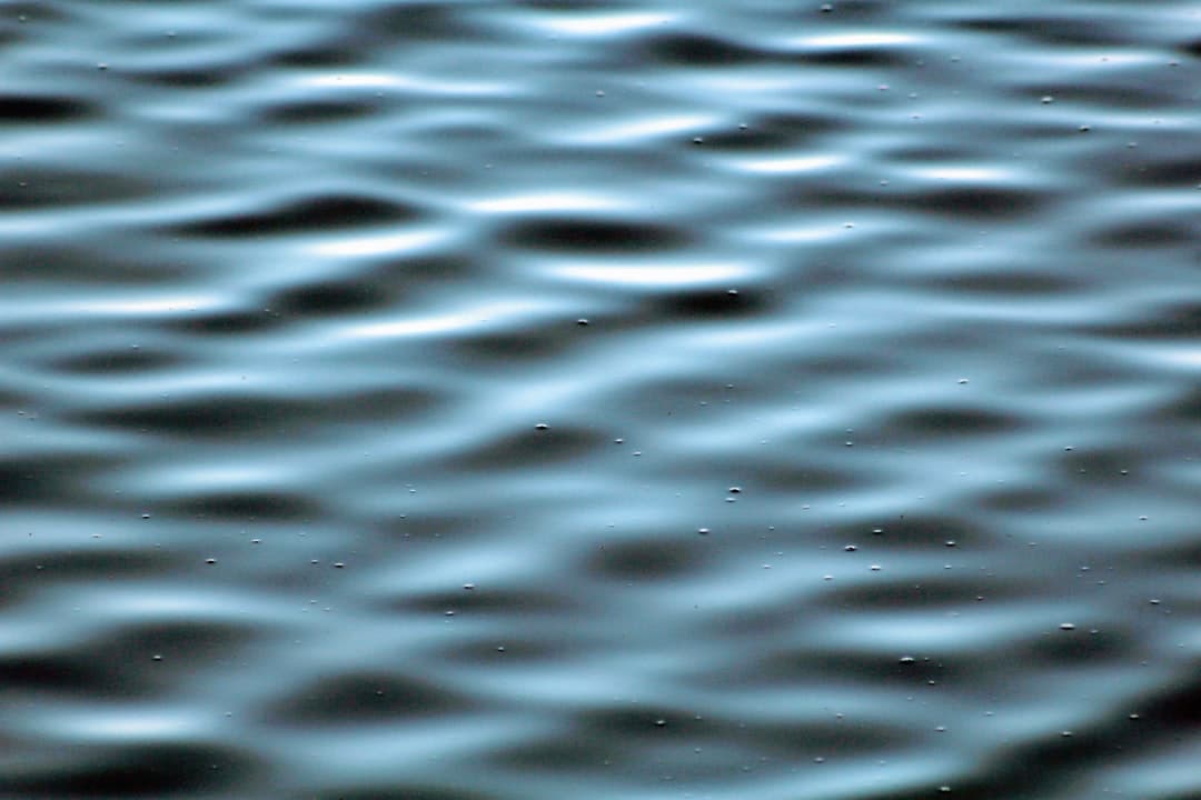 Deep water ripples representing depth of analysis and insight